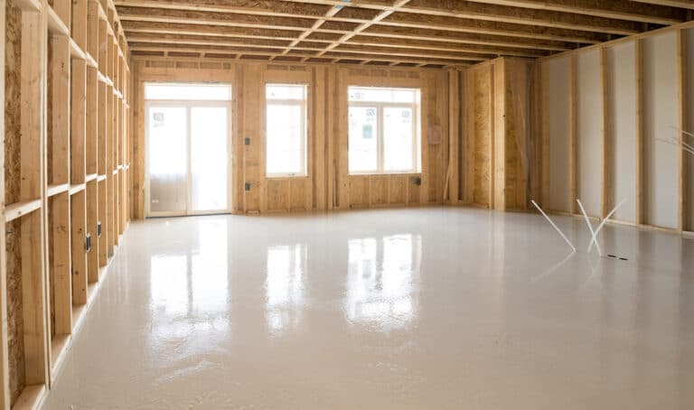 The floor after cement is poured in a residential construction site.